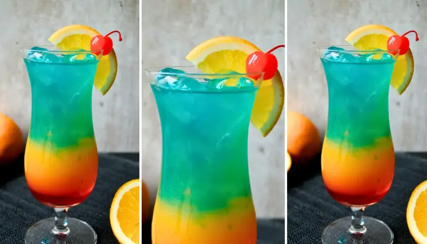 Kolorowy drink ze spritem, warstwowy, z pomarańczą i wiśnią. Idealny na letnie orzeźwienie.
